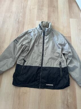 Misty Mountain grey and black waterproof jacket with full zip and zip pockets